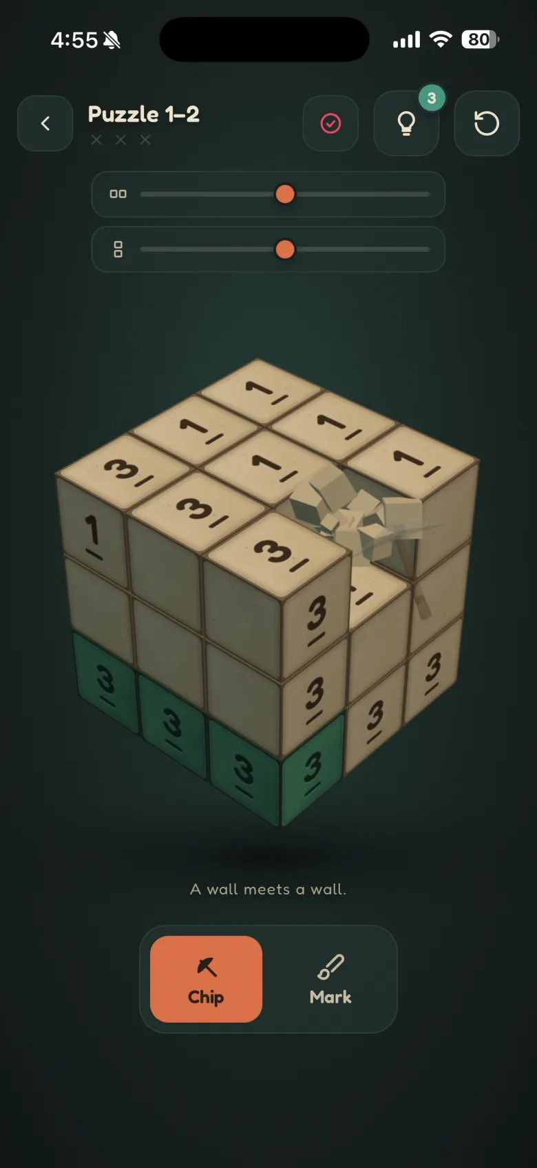 Solving a Carve puzzle: a cube of numbered blocks mid-chip